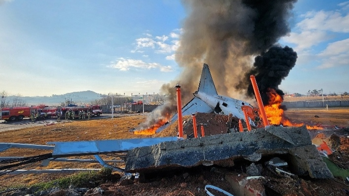 韓國(guó)客機(jī)起火已致58人死亡